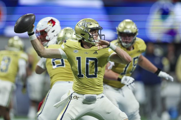 Georgia Tech quarterback Haynes King (10) attempts a pass during the fourth quarter against Louisville in the Aflac Kickoff Game at Mercedes-Benz Stadium, Friday, September 1, 2023, in Atlanta. Georgia Tech lost to Louisville 39-34. (Jason Getz / Jason.Getz@ajc.com)