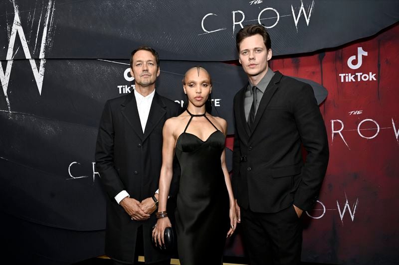 Rupert Sanders, from left, FKA twigs, and Bill Skarsgard attend "The Crow" world premiere at the Village East by Angelika on Tuesday, Aug. 20, 2024, in New York. (Photo by Evan Agostini/Invision/AP)