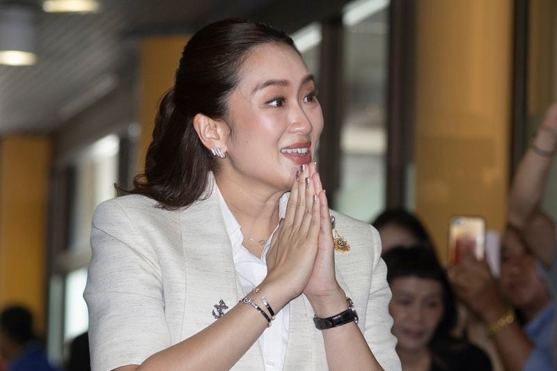 Leader of the Pheu Thai party, Paetongtarn Shinawatra arrives at the party's headquarters in Bangkok, Thailand, Friday, Aug. 16, 2024. (AP Photo/Wason Wanichakorn)