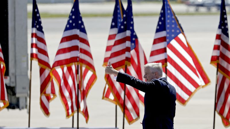 Republican National Committee chair Michael Whatley gives a thumbs up after addressing the crowd before Republican presidential nominee former President Donald Trump speaks at a campaign event at Wilmington International Airport in Wilmington, N.C., Saturday, Sept. 21, 2024. (AP Photo/Chris Seward)