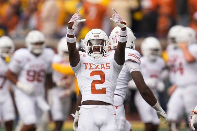 Texas defensive back Derek Williams Jr. (2) celebrates a Michigan turnover in the second half of an NCAA college football game in Ann Arbor, Mich., Saturday, Sept. 7, 2024. (AP Photo/Paul Sancya)