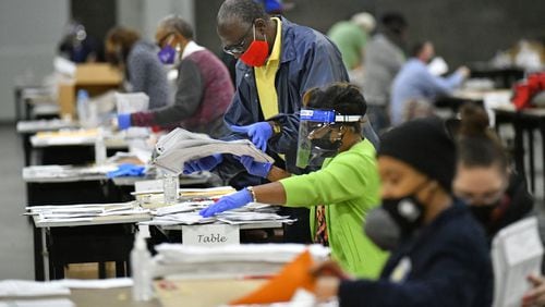 State election investigators blamed “human error” for mistakes made during a Fulton County audit of the 2020 presidential election. The audit relied on sorting paper ballots by candidate, counting them by hand, writing totals on sheets of paper and then transcribing numbers into computers, according to a consent order and investigative files obtained by The Atlanta Journal-Constitution through the Georgia Open Records Act. The consent order found that the errors were not the result of intentional misconduct. (Hyosub Shin / Hyosub.Shin@ajc.com)