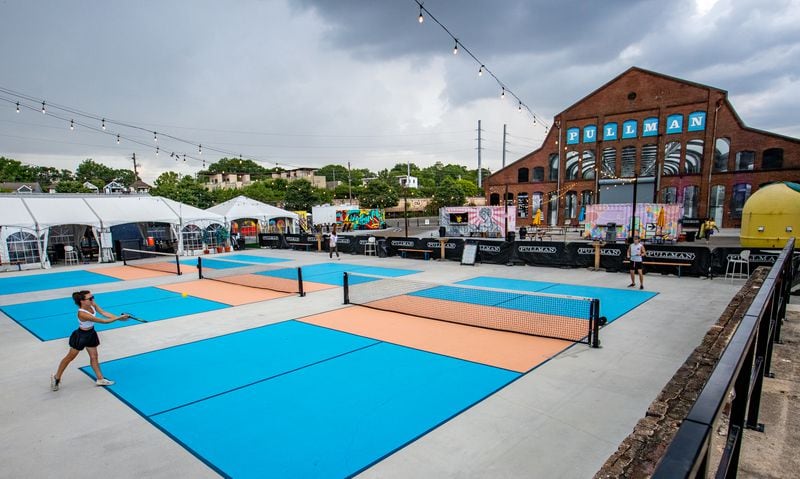 Pickleball courts at Pullman Yards. The popularity of the sport and the need for more pickleball courts has caused some friction with Atlanta's established tennis community. (Jenni Girtman for The Atlanta Journal-Constitution)
