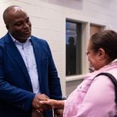 Bryan Johnson, the sole finalist for superintendent of Atlanta Public Schools, greets community members at The New Schools at Carver in Atlanta on Tuesday, June 25, 2024. (Seeger Gray / AJC)