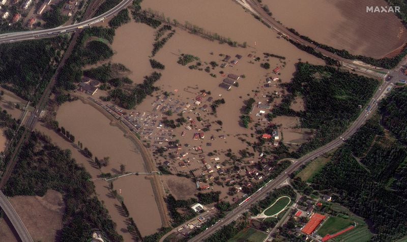 This satellite image released by Maxar Technologies shows flooded homes and fields following record rains in Ostrava, Czech Republic, Tuesday, Sept. 17, 2024. (Satellite image ©2024 Maxar Technologies via AP)