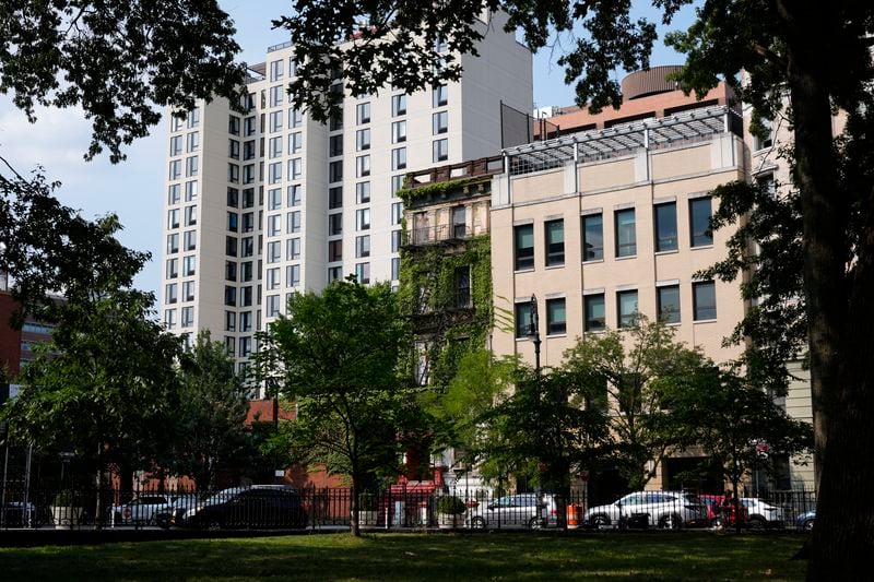 Buildings in the Harlem neighborhood of New York are pictured Thursday, Aug. 15, 2024. (AP Photo/Pamela Smith)