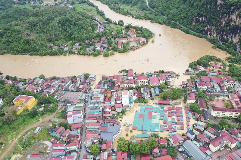 Flood triggered by Typhoon Yagi submerges houses in Lang Son province, Vietnam Monday, Sept. 9, 2024. (Nguyen Anh Tuan/VNA via AP)