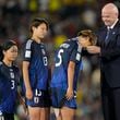 FIFA President Gianni Infantino, right, gives he second-place medal to Japan's Manaka Hayashi after her team lost the U-20 Women's World Cup final soccer match to North Korea at El Campin stadium in Bogota, Colombia, Sunday, Sept. 22, 2024. (AP Photo/Fernando Vergara)