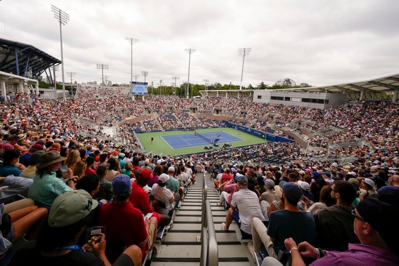 FILE - Tennis fans watch play during the first round of the U.S. Open tennis championships, Monday, Aug. 28, 2023, in New York.The 2024 U.S. Open begins Monday, Aug. 26.(AP Photo/Manu Fernandez, File)