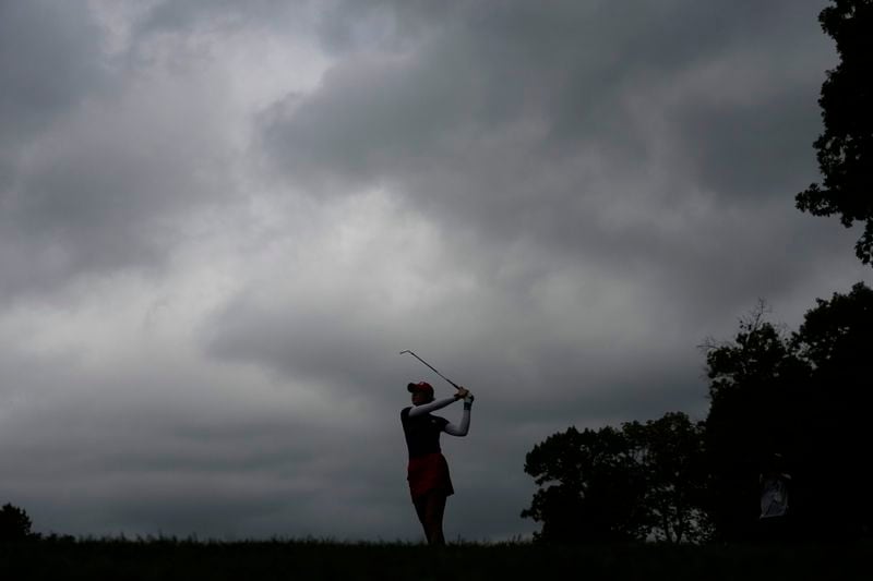 United States' Nelly Korda watches her shot on the first hole during a Solheim Cup golf tournament fourball match at Robert Trent Jones Golf Club, Friday, Sept. 13, 2024, in Gainesville, Va. (AP Photo/Matt York)