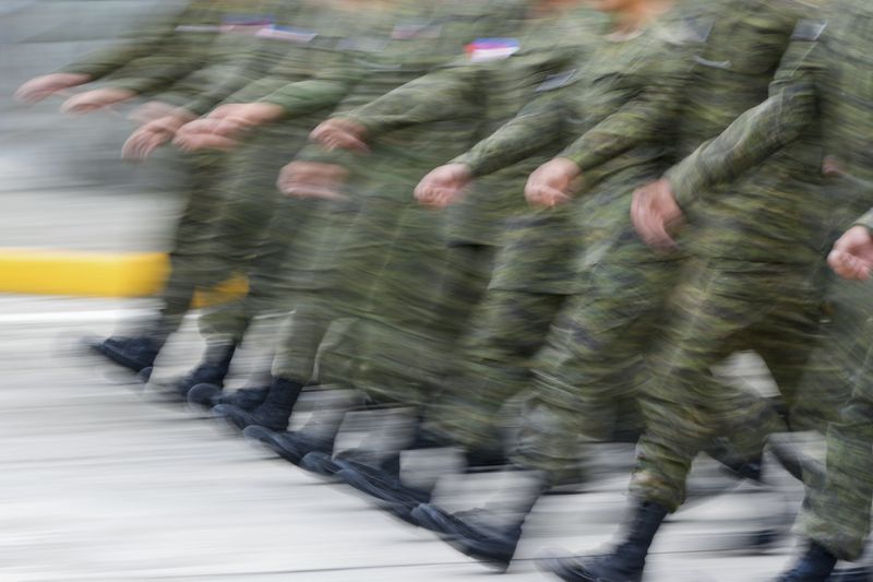 Cadets of the Philippine Military Academy march in formation at Fort Gregorio Del Pilar in Baguio, northern Philippines on Thursday, Aug. 29, 2024. (AP Photo/Aaron Favila)