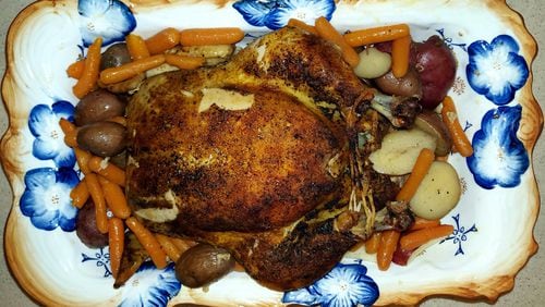 Oven roasted chicken with carrots and new potatoes. / Photo credits: Rhonda Dehbozorgi