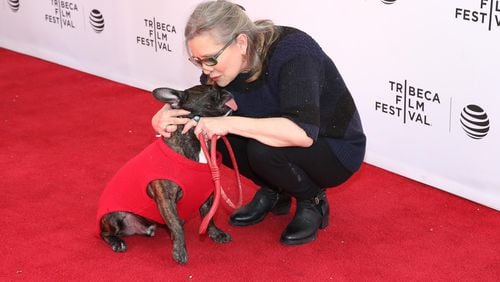 FILE PHOTO: Gary the dog and Carrie Fisher attend Tribeca Tune In: Catastrophe at SVA Theatre 2 on April 19, 2016 in New York City.  (Photo by Robin Marchant/Getty Images for Tribeca Film Festival)