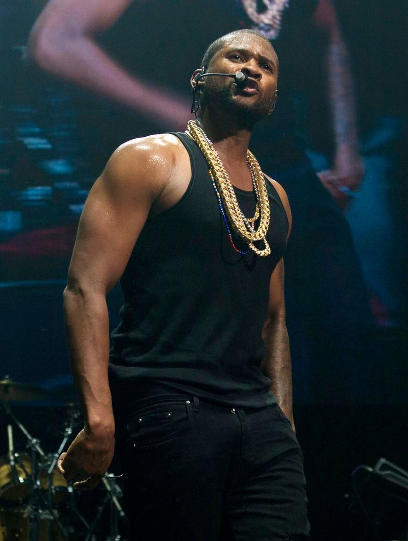 FILE - Usher performs at Power 105.1's Powerhouse 2016 at Barclays Center in New York on Oct. 27, 2016. He was added to the lineup for the Essence Festival of Culture, which runs July 4-7 in New Orleans. (Photo by Scott Roth/Invision/AP, File)