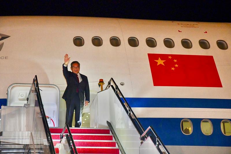 In this photo released by Malaysia's Department of Information, China's Premier Li Qiang waves as he arrives at Sepang International Airport in Kuala Lumpur, Malaysia, Tuesday, June 18, 2024. (Malaysia's Department of Information via AP)