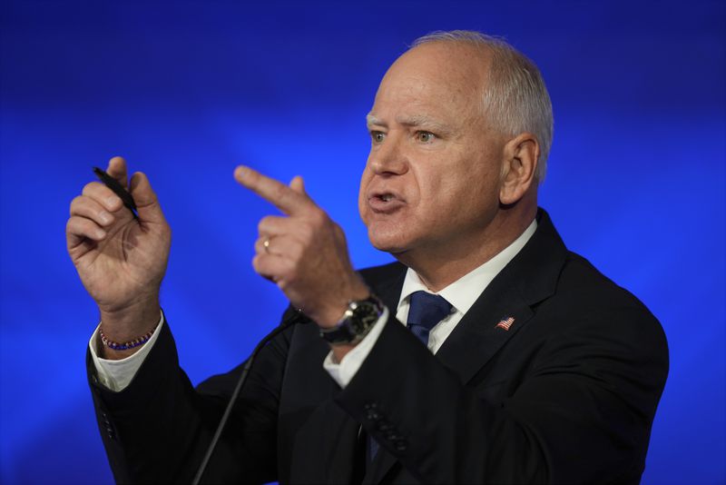 Democratic vice presidential nominee Minnesota Gov. Tim Walz speaks during a vice presidential debate hosted by CBS News, with Republican vice presidential nominee Sen. JD Vance, R-Ohio, Tuesday, Oct. 1, 2024, in New York. (AP Photo/Matt Rourke)