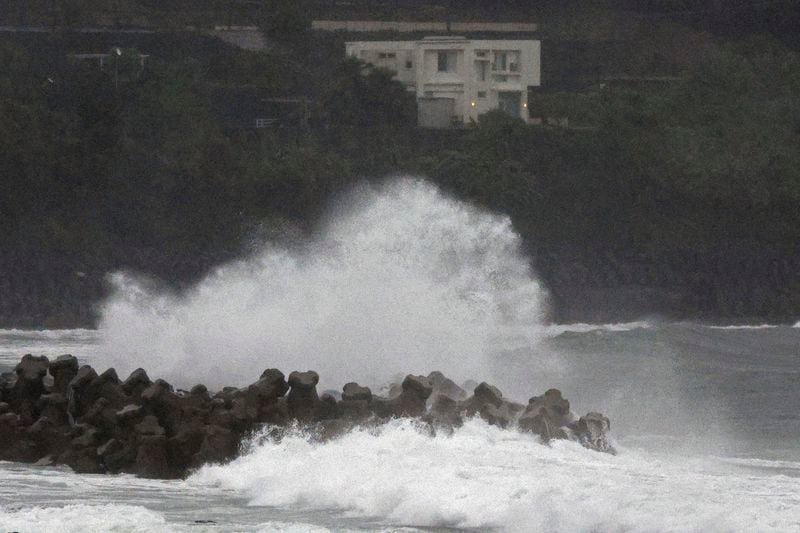 Waves hit a coastal area in Makurazaki, Kagoshima prefecture, western Japan, Wednesday, Aug. 28, 2024, as a typhoon is approaching. (Hidetaka Komukai/Kyodo News via AP)