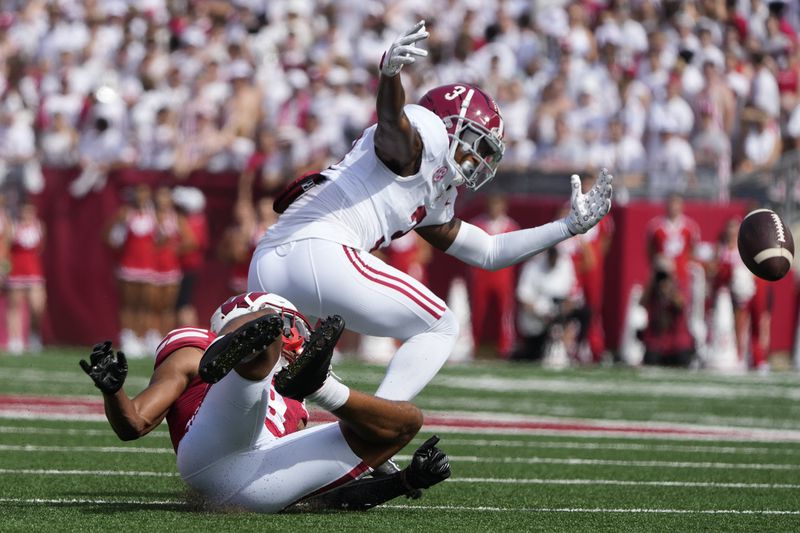 Alabama's Keon Sabb (3) breas up a pass intended for Wisconsin's Bryson Green (9) during the first half of an NCAA college football game Saturday, Sept. 14, 2024, in Madison, Wis. (AP Photo/Morry Gash)