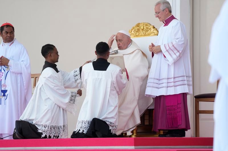 Pope Francis presides over a votive mass of the Blessed Virgin Mary Queen in Tacitolu, some 8 kilometers west of Dili, East Timor, Tuesday, Sept. 10, 2024. Pope Francis presides over a mass in a seaside park on the same field where St. John Paul II celebrated an historic liturgy during East Timor's fight for independence from Indonesian rule. (AP Photo/Gregorio Borgia)