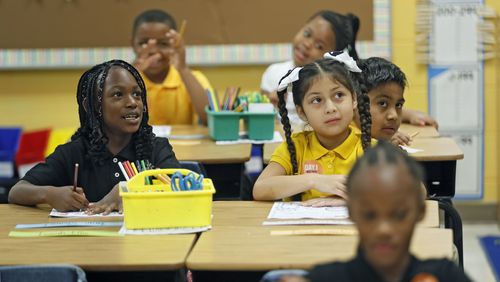 8/1/18 - Atlanta -  Students are introduced to  a math assignment in Hannah Reisman's second grade class.   It was the first day of school at Peyton Forest Elementary school, which is  celebrating its 50th anniversary.   Teachers and staff welcomed the kids with a circus theme.  BOB ANDRES  /BANDRES@AJC.COM