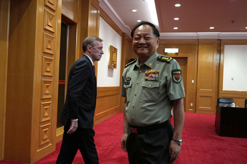 White House national security adviser Jake Sullivan, left walks past Zhang Youxia, Vice Chairman of the CPC Central Military Commission at right before a meeting at the Bayi building in Beijing, Thursday, Aug. 29, 2024. (AP Photo/Ng Han Guan, Pool)