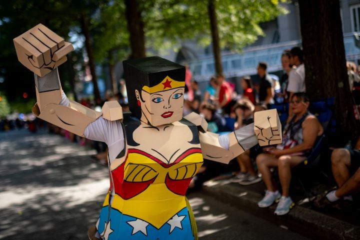 Thousands lined up along Peachtree Street Saturday morning for the annual Dragon Con parade.