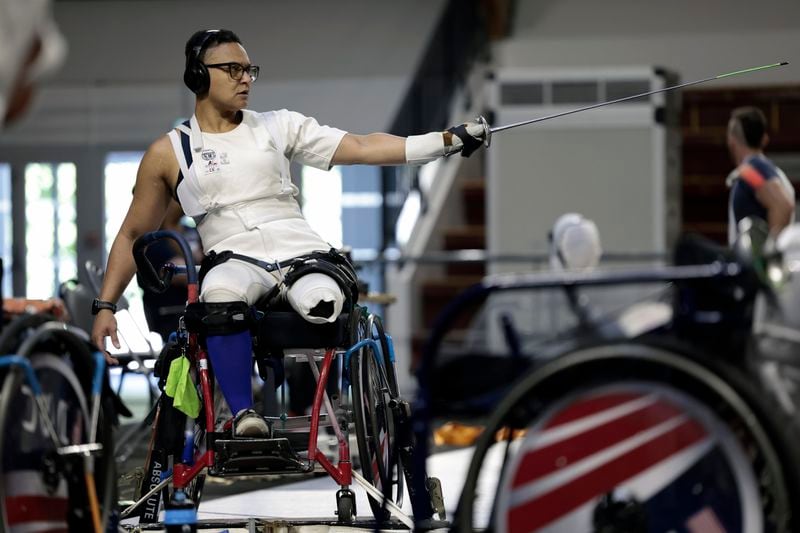 Wheelchair fencer Jataya Taylor from the U.S. practices during a media tour of the U.S. Team High Performance Center during the Paralympic Games in Paris on Wednesday, Aug. 28, 2024. (AP Photo/Avni Trivedi)