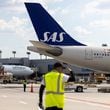 A Scandinavian Airlines plane from Copenhagen arrives at Hartsfield-Jackson airport in Atlanta on Monday, June 17, 2024. The airport and airline hosted an inaugural flight event for a new route of daily nonstop flights between Atlanta and Copenhagen. (Arvin Temkar / AJC)
