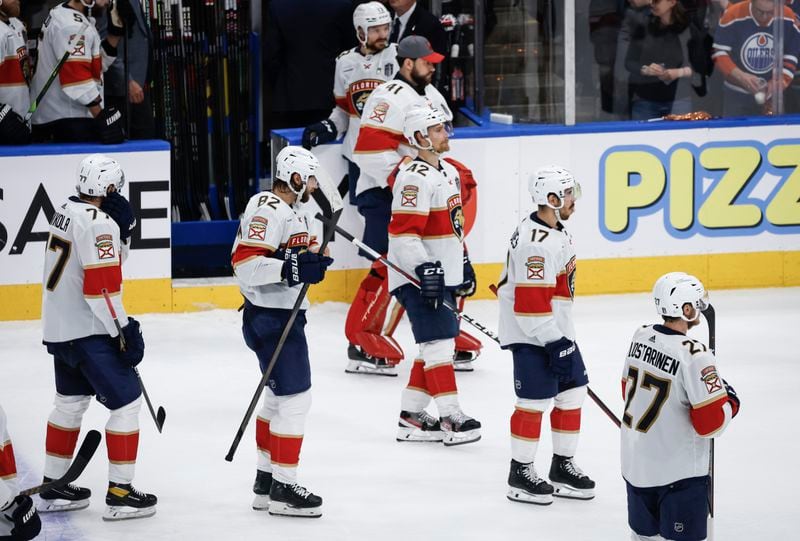 Florida Panthers players prepare to leave the ice after Game 6 of the NHL hockey Stanley Cup Final, Friday, June 21, 2024, in Edmonton, Alberta. The Edmonton Oilers won 5-1 to tie the series. (Jeff McIntosh/The Canadian Press via AP)