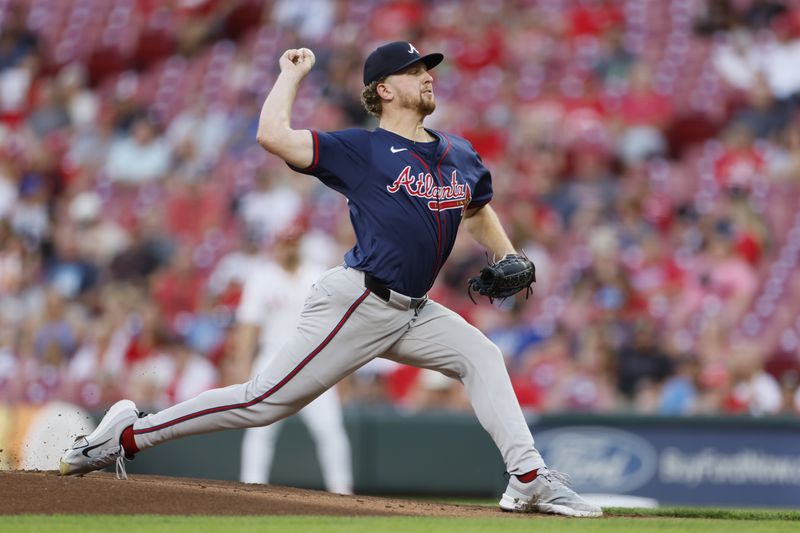 Atlanta Braves starting pitcher Spencer Schwellenbach throws against the Cincinnati Reds during the first inning of a baseball game, Wednesday, Sept. 18, 2024, in Cincinnati. (AP Photo/Jay LaPrete)