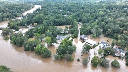 An aerial view shows the Vinings area and the Lovett School on Sept. 27, after the Chattahoochee River flooded in the aftermath of Hurricane Helene. (Miguel Martinez/AJC)