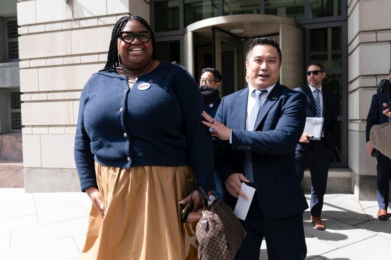 TikTok content creators Talia Cadet, left, and Paul Tran leave the federal courthouse in Washington, Monday, Sept. 16, 2024, after a hearing on TikTok's lawsuit against the federal government. (AP Photo/Jose Luis Magana)