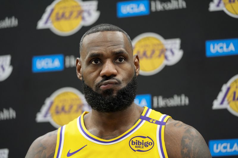 Los Angeles Lakers' LeBron James listens to questions from the media during the NBA basketball team's media day in El Segundo, Calif., Monday, Sept. 30, 2024. (AP Photo/Jae C. Hong)