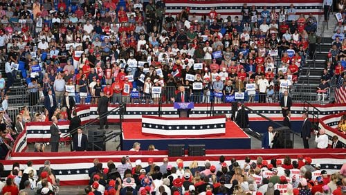 Former President Donald Trump speaks during a rally at the Georgia State University’s convocation center on Saturday in Atlanta.  (Hyosub Shin / AJC)