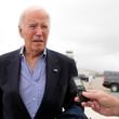 President Joe Biden speaks to reporters before boarding Air Force One at Dover Air Force Base, in Dover, Del., Sunday, Sept. 29, 2024, to return to Washington. (AP Photo/Manuel Balce Ceneta)