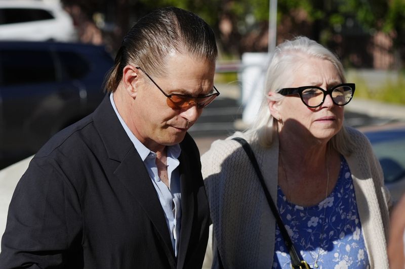 Actor Stephen Baldwin, left, and his sister Elizabeth Keuchler arrive at the courthouse for the second day of their brother Alec Baldwin's trial Thursday, July 11, 2024, in Santa Fe, NM. Baldwin is facing a single charge of involuntary manslaughter in the death of a cinematographer. (AP Photo/Ross D. Franklin)