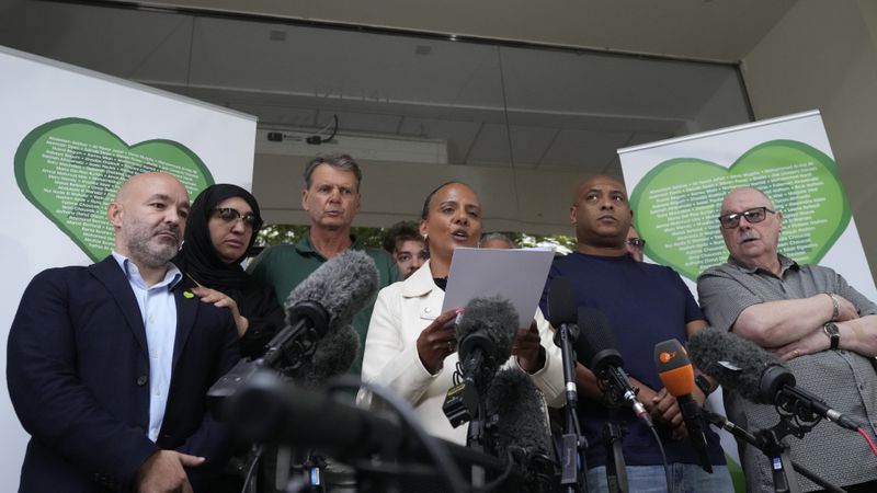 Natasha Elcock a survivor of the Grenfell Tower fire speaks to the media on behalf of relatives of the deceased and people directly affected by the fire a following the final report into the fire being released in London, Wednesday, Sept. 4, 2024. The report on the fire in which 72 people were killed in June 2017, says decades of failure by government and industry made the high-rise a "death trap". (AP Photo/Frank Augstein)