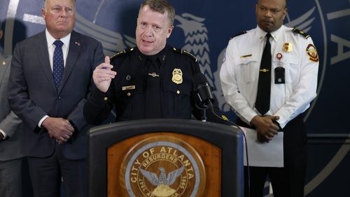 Atlanta Police Chief Darin Schierbaum, flanked by Georgia Insurance and Safety Fire Commissioner John King and James McLemore, First Deputy Chief with the Atlanta Fire Rescue Department, speaks during a press conference at the APD headquarters on Wednesday, January 17, 2024. The agency asked for the community's support to report crime activity related to the construction of Atlanta’s Public Safety Training Center, the reward could reach up to 200,000.
Miguel Martinez /miguel.martinezjimenez@ajc.com