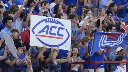 Fans in the SMU student section hold up a sign during the first half of an NCAA college football game against Florida State, Saturday, Sept. 28, 2024, in Dallas. (AP Photo/LM Otero)