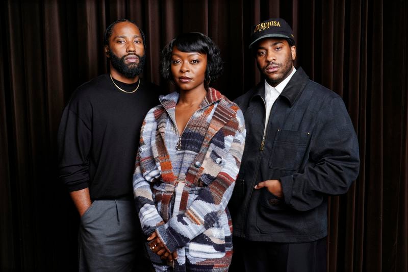 Malcolm Washington, right, the director/co-screenwriter of the film "The Piano Lesson," poses with his brother and cast member John David Washington, left, and cast member Danielle Deadwyler at the Shangri-La Hotel during the Toronto International Film Festival, Monday, Sept. 9, 2024, in Toronto. (AP Photo/Chris Pizzello)