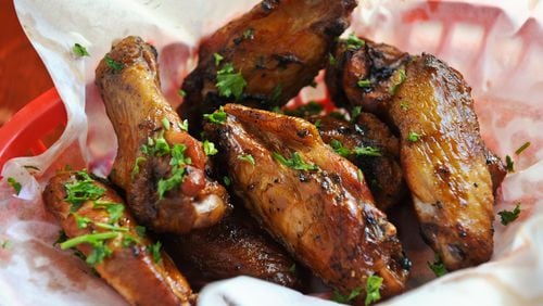 Smoke 'Em If Ya Got 'Em- 48 hour marinated wings, slow smoked, double dipped or naked from Bone Lick BBQ.