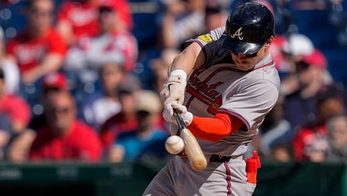 Atlanta Braves' Jarred Kelenic hits a three-run homer during the ninth inning of a baseball game against the Washington Nationals at Nationals Park, Sunday, June 9, 2024, in Washington. Nationals won 8-5. (AP Photo/Alex Brandon)