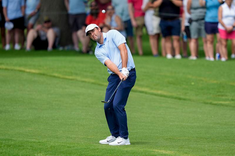 Scottie Scheffler chips onto the ninth green during the first round of the Charles Schwab Challenge golf tournament at Colonial Country Club, Thursday, May 23, 2024, in Fort Worth, Texas. (AP Photo/LM Otero)