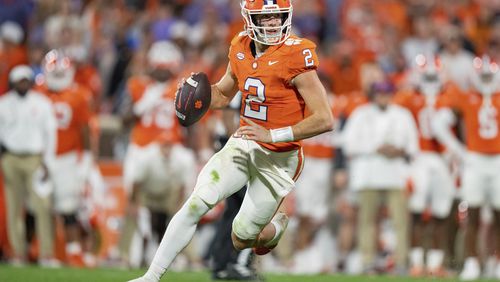 FILE - Clemson quarterback Cade Klubnik (2) plays against North Carolina during an NCAA college football game, Nov. 18, 2023, in Clemson, S.C. (AP Photo/Jacob Kupferman, File)