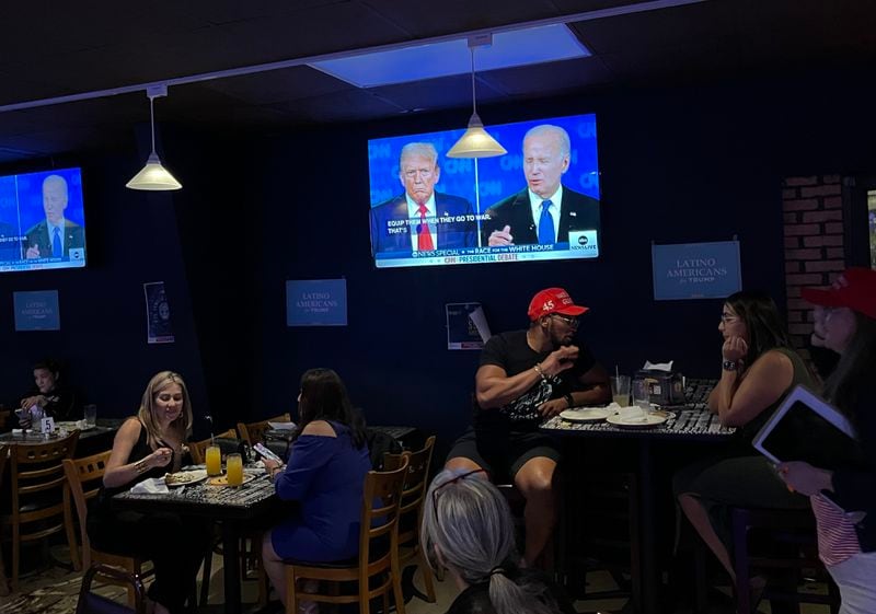 Over three dozen people filled a Venezuelan restaurant in Duluth on Thursday evening to catch the CNN Presidential Debate.