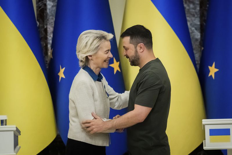 Ursula von der Leyen, left, President of the European Commission, greets Ukrainian President Volodymyr Zelenskyy, following a joint press conference in Kyiv, Ukraine, Friday, Sept. 20, 2024. (Christoph Soeder, Pool Photo via AP)