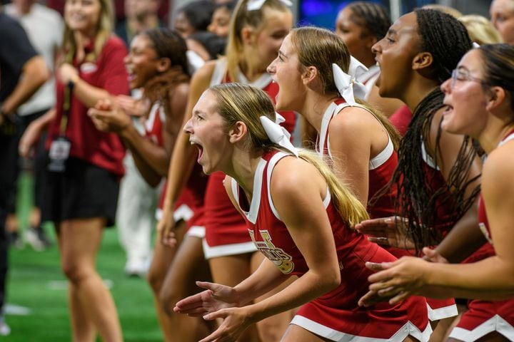 Brookwood’s cheerleaders make noise for their team. (Jamie Spaar for the Atlanta Journal Constitution)