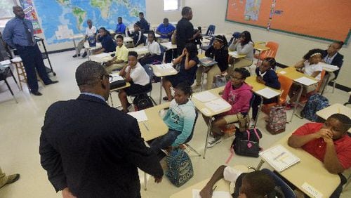 DeKalb County School District Superintendent Steve Green visits with students at Chapel Hill Middle School on the first day of school in 2015. AJC FILE PHOTO