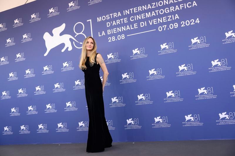 Angelina Jolie poses for photographers at the photo call for the film 'Maria' during the 81st edition of the Venice Film Festival in Venice, Italy, on Thursday, Aug. 29, 2024. (Photo by Vianney Le Caer/Invision/AP)