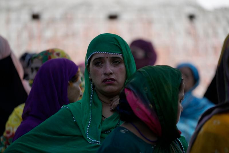 Women voters queue up to cast their vote at a polling booth during the first phase of the Jammu and Kashmir assembly election, in Kishtwar, India, Wednesday, Sept. 18, 2024. (AP Photo/Channi Anand)